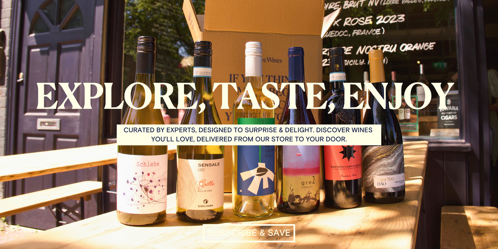 Wine bottles displayed on a table with promotional text overlay - Reserve Wines