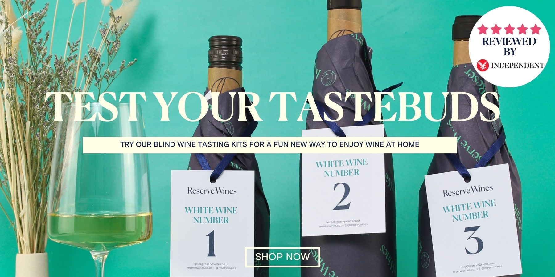 Blind wine tasting kits with bottles, glasses, and labels on a teal background.