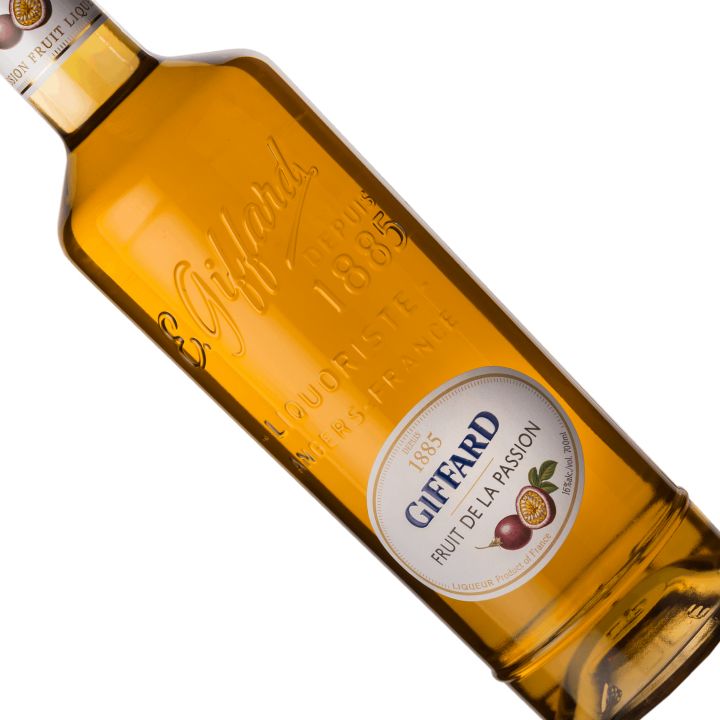 Bottle of Giffard passion fruit liqueur with a white background