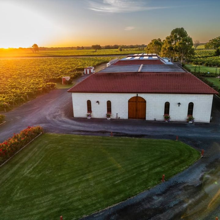 Aerial view of a Leconfield Coonawarra winery and vineyard at sunset.