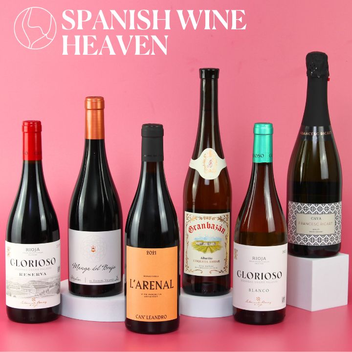 Collection of Spanish wine bottles with 'Spanish Wine Heaven' branding on a pink background